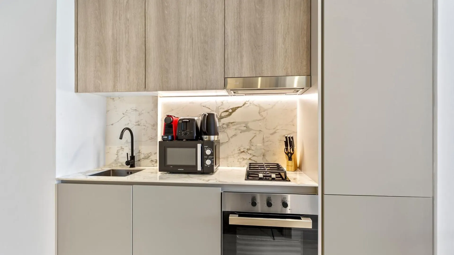 Stylish Studio With Warm Terracotta Details Dubai Apartment